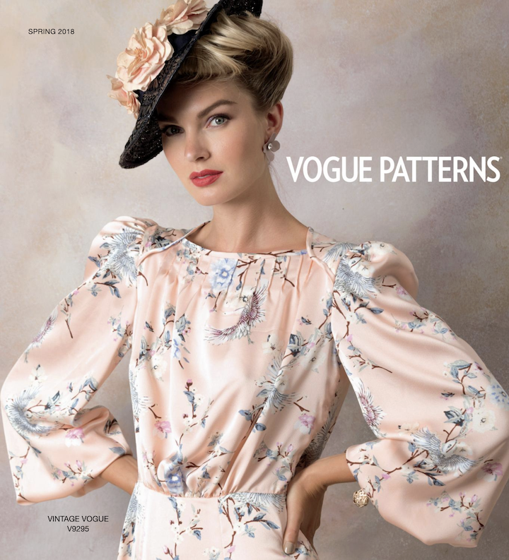VOGUE PATTERNS, Spring 2018. A model poses in a pink, floral print, long-sleeved dress, Vintage Vogue V9295